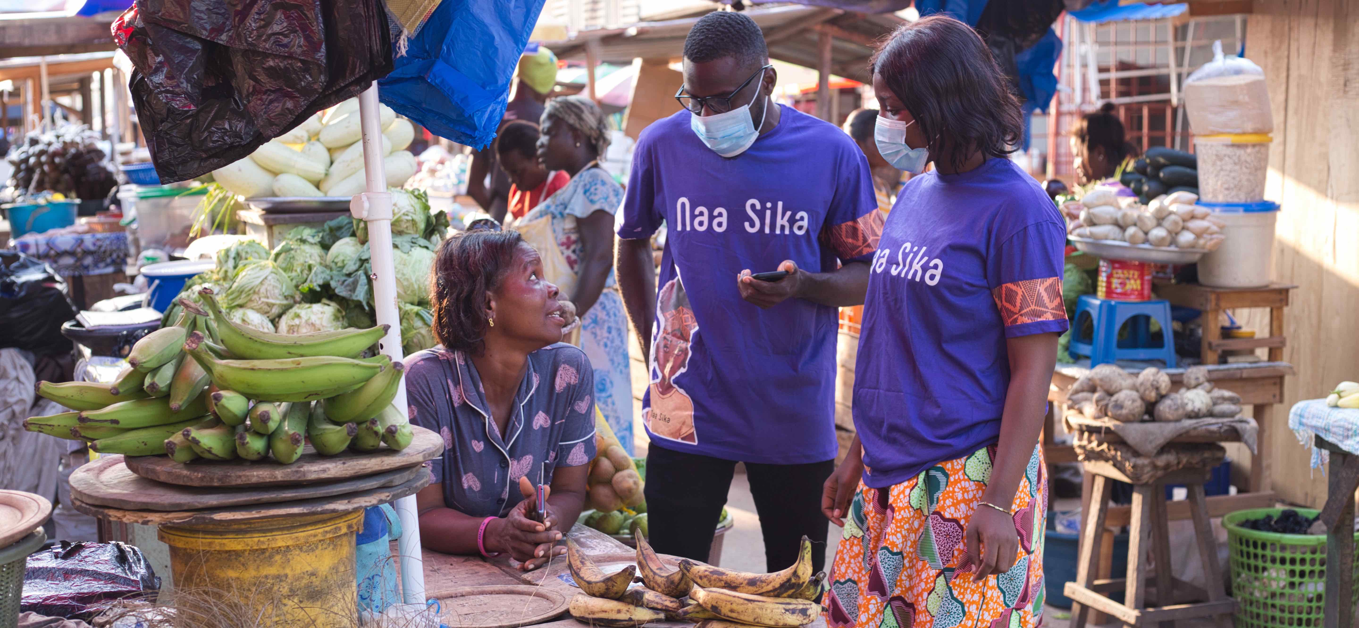 Market vendors using Naa Sika